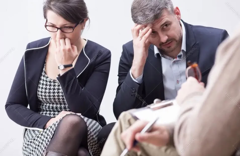A couple with counsellor seeking assistance to address issues